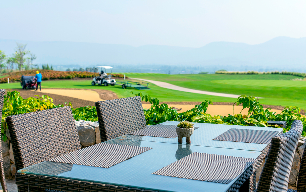 Dining table with view of golf course greens, cosy and relaxation